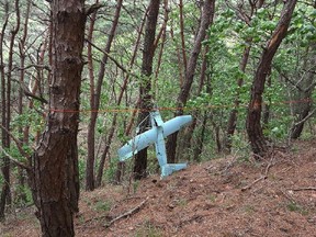 A suspected North Korean drone is seen in a mountain in Inje, South Korea on Friday, June 9, 2017.