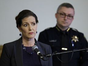 Oakland Mayor Libby Schaaf, left, speaks beside then Oakland police chief Sean Whent in Oakland, Calif. on May 13, 2016. Schaaf approved of the deal.