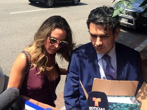 Mexican actress Kate del Castillo arrives to the headquarters of the Organization of American States in Washington on Thursday June 29, 2017.  Lawyer Federico Mery Sanson is on right.  (AP Photo/Luis Alonso Lugo)