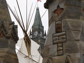 A large teepee erected by indigenous demonstrators to kick off a four-day Canada Day protest stands in front of Parliament Hill in Ottawa on Thursday, June 29, 2017.