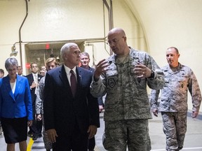 Vice President Mike Pence, center, tours the Cheyenne Mountain Air Force Station Friday, June 23, 2017, during his visit to Colorado Springs, Colo. (Christian Murdock/The Gazette via AP, Pool)