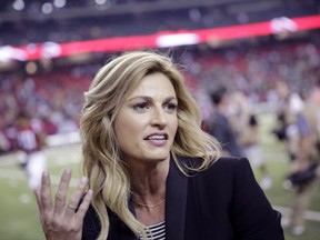 FILE - In this Oct. 30, 2016 file photo, Fox Sports broadcaster Erin Andrews, left, speaks with Atlanta Falcons wide receiver Julio Jones after an NFL football game against the Green Bay Packers in Atlanta. Jennifer Allen, a publicist for Andrews, confirms Sunday, June 25, 2017, that the 38-year-old Fox Sports sideline reporter and "Dancing with the Stars" co-host married the 35-year-old Stoll over the weekend.  (AP Photo/David Goldman, File)
