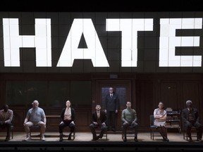 This image released by DKC/O&M shows the cast of Broadway's "1984," based on George Orwell's book, at the Hudson Theatre in New York. Richard Blair, whose father finished the book in 1949 when he was a young boy, was in New York on Thursday to cheer on the cast amid a huge jump in interest of his father's nightmarish vision of the future. (Julieta Cervantes/DKC/O&M via AP)