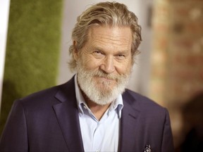 FILE - In this Feb. 22, 2017 file photo, Jeff Bridges attends the Global Green USA 14th Annual Pre-Oscar Party in Los Angeles.  Bridges has played a president in the movies. But when it comes to critiquing the role of today's real-life president, the actor is a lot more laid back than dramatic.The Oscar-winning actor supported Hillary Clinton last fall but says he would continue "rooting" for the president "to do the cool thing." That includes ending child hunger in the United States, which is a topic Bridges spoke about Wednesday at the Western Governors Association in Whitefish, Mont. (Photo by Richard Shotwell/Invision/AP, File)