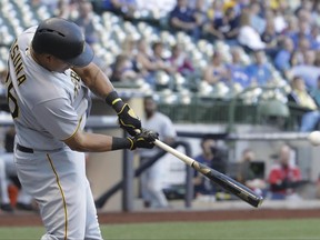 Pittsburgh Pirates' Jose Osuna hits a three-run home run during the first inning of a baseball game against the Milwaukee Brewers Tuesday, June 20, 2017, in Milwaukee. (AP Photo/Morry Gash)