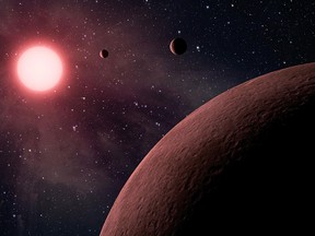 An artist's concept depicts a tiny planetary system called KOI-961, based on data received through NASA's Kepler mission and ground-based telescopes.