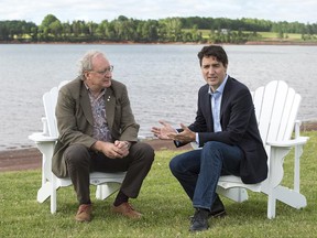Prime Minister Justin Trudeau chats with Premier Wade MacLauchlan in Cardigan, P.E.I. on Thursday, June 29, 2017. THE CANADIAN PRESS/Andrew Vaughan