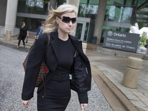 Christina Albini, a former teacher, leaves the Ontario Court of Justice after pleading guilty to sexual interference, Monday, May 1, 2017.