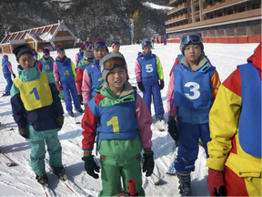 North Korean children attend a ski class, at the Masik Pass Ski Resort in Wonsan, North Korea. North Korea is lashing out at international sanctions over its nuclear and missile programs, saying they are being misapplied to everything from frozen chicken to skis