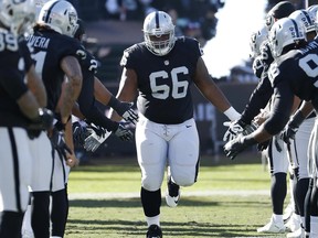FILE - In this Dec. 24, 2016, file photo, Oakland Raiders guard Gabe Jackson (66) is introduced before an NFL football game against the Indianapolis Colts in Oakland, Calif. The Oakland Raiders have locked up another member of their stellar 2014 draft class, agreeing to a five-year extension to keep guard Gabe Jackson under contract through the 2022 season. A person familiar with the deal said Friday, June 30, 2017, that it is worth $56 million. The person spoke on condition of anonymity because the deal and its terms have not been announced. (AP Photo/Tony Avelar, File)