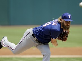Texas Rangers starting pitcher Andrew Cashner delivers in the first inning of a baseball game against the Cleveland Indians, Thursday, June 29, 2017, in Cleveland. (AP Photo/Tony Dejak)