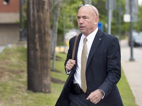RCMP Commissioner Bob Paulson arrives to testify at the RCMP's trial on violating four charges of the Canada Labour Code in Moncton, N.B. on Thursday, June 15, 2017. The charges are related to the June 2014 shooting spree that claimed the lives of three officers.