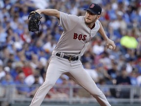 Boston Red Sox starting pitcher Chris Sale throws during the first inning of a baseball game against the Kansas City Royals Tuesday, June 20, 2017, in Kansas City, Mo. (AP Photo/Charlie Riedel)