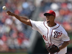 Washington Nationals starting pitcher Joe Ross delivers during the first inning of a baseball game against the Cincinnati Reds, Saturday, June 24, 2017, in Washington. (AP Photo/Nick Wass)