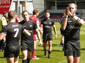 Veteran Wolfpack forward Richard Whiting, right, applauds fans after Toronto's Ladbrokes Challenge Cup rugby action loss to the Salford red Devils in Salford, England on April 23, 2017. THE CANADIAN PRESS/HO-Touchlinepics.com-Stephen Gaunt