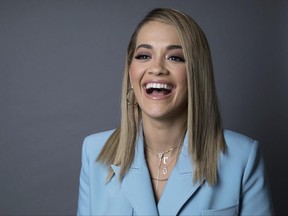 In this June 20, 2017 photo actress and singer Rita Ora poses for a portrait in New York to promote her new show "Boy Band" which premieres Thursday on ABC. (Photo by Amy Sussman/Invision/AP)