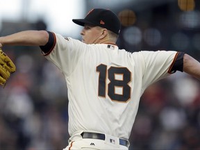 San Francisco Giants pitcher Matt Cain works against the Colorado Rockies during the first inning of a baseball game Tuesday, June 27, 2017, in San Francisco. (AP Photo/Ben Margot)