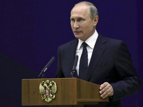 Russian President Vladimir Putin speaks before the officers of the Russian Foreign Intelligence at the headquarters of the Foreign Intelligence Service in Moscow, Russia, Wednesday, June 28, 2017. Putin attended a meeting marking the 95th anniversary of the Russian Foreign Intelligence's so called 'illegal' section, which oversees agents working undercover abroad. (Mikhail Klimentyev/Pool Photo via AP)