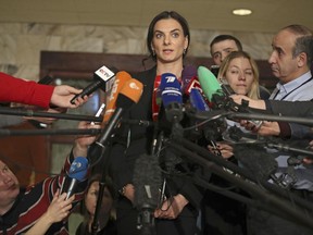 FILE - In this Dec. 9, 2016, file photo, former Russian pole vaulter Yelena Isinbayeva speaks to the media in Moscow, Russia. Alexander Ivlev, an accountancy executive, has taken the place of pole vault record holder Yelena Isinbayeva as chair of the embattled Russian Anti-Doping Agency, Tuesday, June 27, 2017. (AP Photo/Pavel Golovkin, File)
