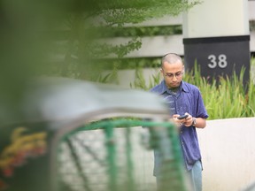 Salman Hossain outside Gloria Jeanís Coffees in Dhaka, Bangladesh.