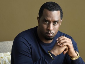 In this June 19, 2017 photo, Sean Combs, producer of the documentary film "Can't Stop Won't Stop: A Bad Boy Story," poses for a portrait at the Four Seasons Hotel in Los Angeles. (Photo by Chris Pizzello/Invision/AP)