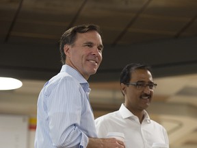 Federal Finance Minister Bill Morneau along with the Honourable Amarjeet Sohi, Minister of Infrastructure and Communities.