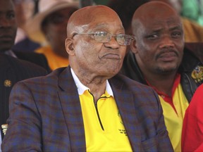 FILE -- In this photo taken Monday, May 1, 2017, South African President Jacob Zuma attends a May Day rally in Bloemfontein, South Africa, where he was jeered by labor unionists.  The Constitutional Court ruled Thursday, June 22, 2017, in Johannesburg, that a parliamentary vote of no confidence in Zuma could be by secret ballot, saying it is up to the speaker of parliament to decide. (AP Photo/Khothatso Mokone, FILE)