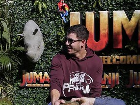 Actors Jack Black, right, and Nick Jonas pose to the media during a photocall to promote the film "Jumanji: Welcome to the jungle" in Barcelona, Spain, Sunday, June 18, 2017. (AP Photo/Manu Fernandez)
