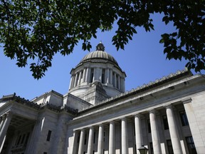 The Legislative Building is shown Friday, June 30, 2017, at the Capitol in Olympia, Wash. Details of a new two-year state operating budget were released Friday, the same day Washington lawmakers must vote on the plan in order to prevent a partial government shutdown. (AP Photo/Ted S. Warren)