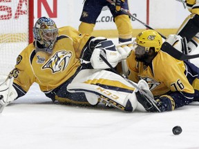 Predators goalie Pekka Rinne and defenseman P.K. Subban stop a shot by the Pittsburgh Penguins during the second period in Game 3 of the Stanley Cup Final on Saturday night in Nashville.