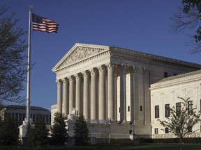 FILE - In this April 4, 2017 file, the Supreme Court in Washington. The Supreme Court says the government can't refuse to register trademarks that are considered offensive. The ruling Monday, June 19, 2017, is a win for an Asian-American rock band called the Slants and it gives a major boost to the Washington Redskins in their separate legal fight over the team name. (AP Photo/J. Scott Applewhite)