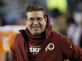 FILE - In this Dec. 26, 2015, file photo, Washington Redskins owner Daniel Snyder walks the sidelines during an NFL football game against the Philadelphia Eagles, in Philadelphia. The Supreme Court on Monday, June 19, 2017, struck down part of a law that bans offensive trademarks, ruling in favor of an Asian-American rock band called the Slants and giving a major boost to the Redskins in their separate legal fight over the team name. (AP Photo/Matt Rourke, File)