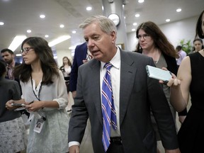 In this June 22, 2017 photo, Sen. Lindsey Graham, R-S.C., chairman of the Senate Judiciary Subcommittee on Crime and Terrorism is shown at the Capitol in Washington.  Graham says he has reason to believe that a conversation he had with a foreigner was intercepted and that someone asked for his name to be unmasked.  An intelligence official told Graham at a congressional hearing on Tuesday that his request is still being processed. (AP Photo/J. Scott Applewhite)