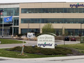 FILE- This April 18, 2017, file photo shows the suburban Minneapolis headquarters of Syngenta in Minnetonka, Minn. A Kansas federal jury awarded nearly $218 million Friday, June 23 to farmers who sued Swiss agribusiness giant Syngenta over its introduction of a genetically engineered corn seed variety. (AP Photo/Jim Mone, File)