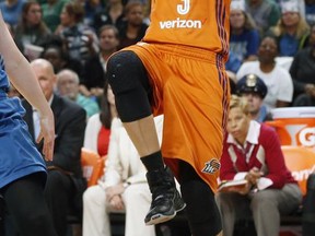 FILE - In this Sept. 28, 2016, file photo, Phoenix Mercury's Diana Taurasi plays against the Minnesota Lynx in the first quarter of a WNBA playoff semifinal basketball game, in St. Paul, Minn. Still thriving at 35, a case could be made that the Phoenix Mercury guard is the greatest player in women's basketball history. (AP Photo/Jim Mone, File)