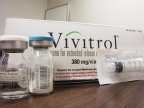 FILE - This Oct. 19, 2016, file photo shows the packaging of Vivitrol at an addiction treatment center in Joliet, Ill. A new study finds only 1 in 4 teens and young adults with opioid addiction receive recommended treatment medication despite having good health insurance. The research suggests that doctors are not keeping up with the needs of youth in the opioid addiction epidemic. The study was published Monday, June 19, 2017, in JAMA Pediatrics. (AP Photo/Carla K. Johnson, File)