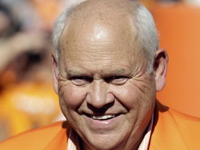 FILE - In this Oct. 15, 2016, file photo, former Tennessee football coach Phillip Fulmer smiles before an NCAA college football game against Alabama, in Knoxville, Tenn. University of Tennessee President Joe DiPietro has hired former Volunteers football coach Phillip Fulmer as his special adviser for community, athletics and university relations. DiPietro announced the hiring Tuesday, June 20, 2017. (AP Photo/Wade Payne, File)