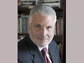 This Dec. 9, 2007 photo released by Yale University shows J.D. McClatchy, a longtime editor of The Yale Review, one of the world's oldest literary publications, in New Haven, Conn. McClatchy, a prize winning poet and librettist, said he is leaving The Yale Review, effective at the end of this month. (Yale University via AP)