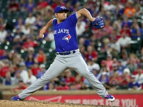 Toronto Blue Jays closer Roberto Osuna pitches against the Texas Rangers on June 21.