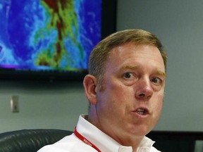 Mississippi Emergency Management Agency Executive Director Lee Smithson, warns of a serious threat of flooding along the Gulf Coast from heavy rain bands predicted to fall out from Tropical Storm Cindy, Tuesday, June 20, 2017, at MEMA headquarters in Pearl, Miss. A number of Mississippi communities are handing out sandbags as rain threatened low-lying areas along rivers and bayous. Flash flooding in low lying areas throughout the southern counties as well as long term flooding along some of the coastal rivers is expected. (AP Photo/Rogelio V. Solis)