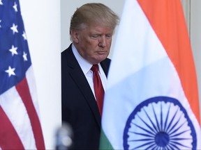 President Donald Trump walks out from the Oval Office to make a joint statement with Indian Prime Minister Narendra Modi in the Rose Garden of the White House in Washington, Monday, June 26, 2017. (AP Photo/Susan Walsh)