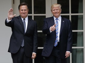 President Donald Trump stands with Panamanian President Juan Carlos Varela at the White House in Washington, Monday, June 19, 2017. (AP Photo/Evan Vucci)