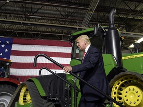 President Donald Trump walks on stage to speaks at Kirkwood Community College, which is recognized by the White House as a major center of agricultural innovation, during a visit to the campus in Cedar Rapids, Iowa, Wednesday, June 21, 2017. This is Trump's first visit to Iowa since the election. (AP Photo/Susan Walsh)