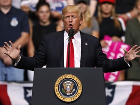 President Donald Trump speaks during a rally, Wednesday, June 21, 2017, in Cedar Rapids, Iowa. (AP Photo/Charlie Neibergall)