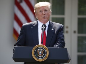 President Donald Trump speaks about the U.S. role in the Paris climate change accord, Thursday, June 1, 2017, in the Rose Garden of the White House in Washington.