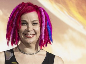 FILE - In this Monday, Feb. 2, 2015 file photo, filmmaker Lana Wachowski attends the premiere of Warner Bros. Pictures' "Jupiter Ascending" at TCL Chinese Theatre in Los Angeles. The fans have spoken, and the canceled Netflix series "Sense8" is coming back next year for a two-hour final episode. Netflix and show co-creator Wachowski said Thursday, June 29, 2017, that fan clamor inspired the show's return. (Photo by Paul A. Hebert/Invision/AP, File)