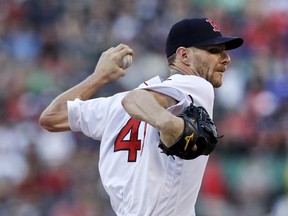 Boston Red Sox starting pitcher Chris Sale delivers during the first inning of a baseball game against the Minnesota Twins at Fenway Park in Boston, Monday, June 26, 2017. (AP Photo/Charles Krupa)