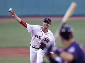 Boston Red Sox starting pitcher Rick Porcello delivers during the first inning of a baseball game against the Minnesota Twins at Fenway Park in Boston, Wednesday, June 28, 2017. (AP Photo/Charles Krupa)