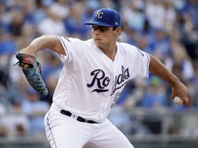Kansas City Royals starting pitcher Jason Vargas throws during the first inning of a baseball game against the Minnesota Twins, Friday, June 30, 2017, in Kansas City, Mo. (AP Photo/Charlie Riedel)
