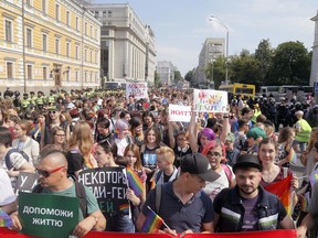 Gay and lesbian rights activists demonstrate in the streets of the capital during the annual Gay Pride parade in Kiev, Ukraine, Sunday, June 18, 2017.